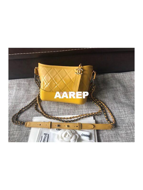 Replica Chanel's Gabrielle Hobo Bag Goatskin, Patent Goatskin Yellow 3