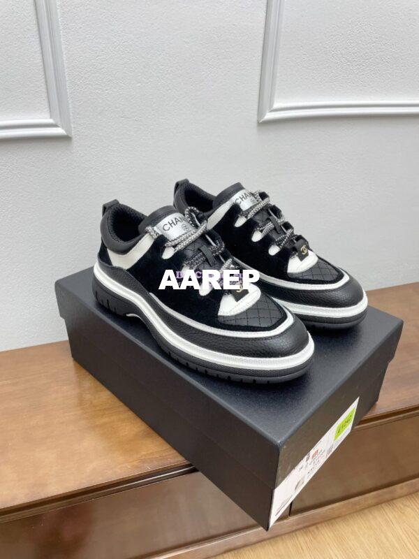 Replica Chanel 25FW Trainer in Grained Calfskin and Suede G46258 Black