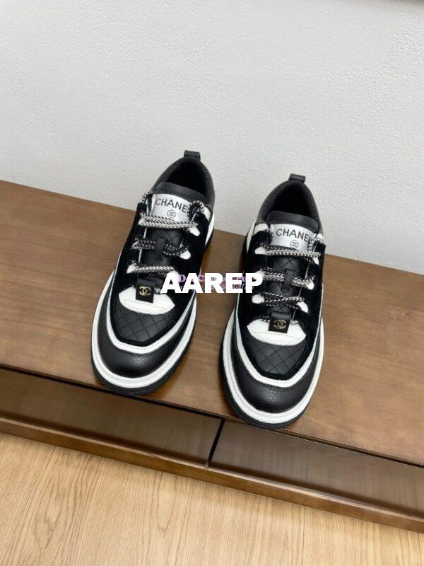 Replica Chanel 25FW Trainer in Grained Calfskin and Suede G46258 Black 3