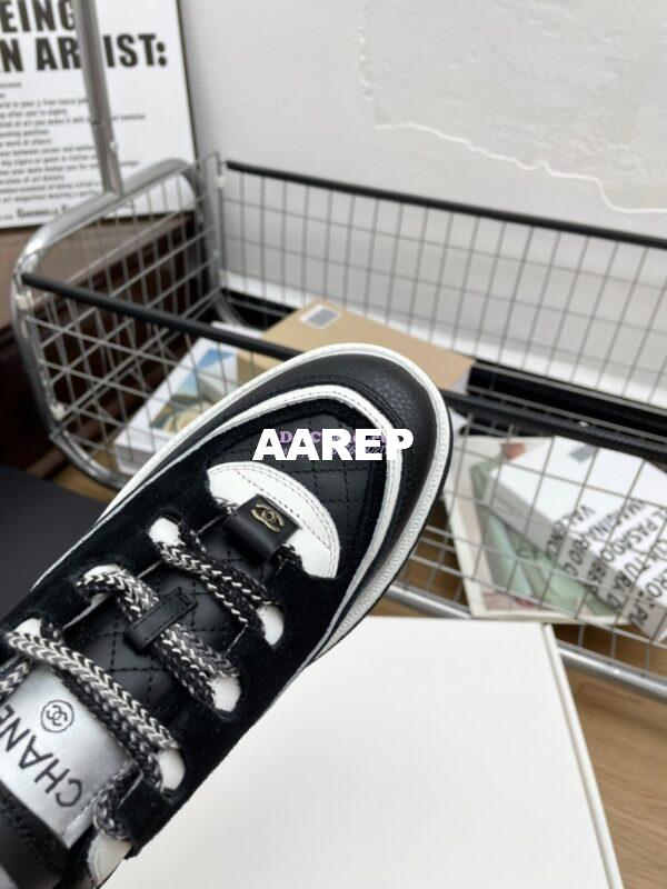 Replica Chanel 25FW Trainer in Grained Calfskin and Suede G46258 Black 4
