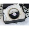 Replica Chanel 23K Limited Edition Camellia Lambskin Pouch AP3584 Black