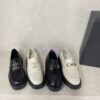 Replica Chanel 24P CC Logo Enamel Loafers Shiny Calfskin G45789 Black