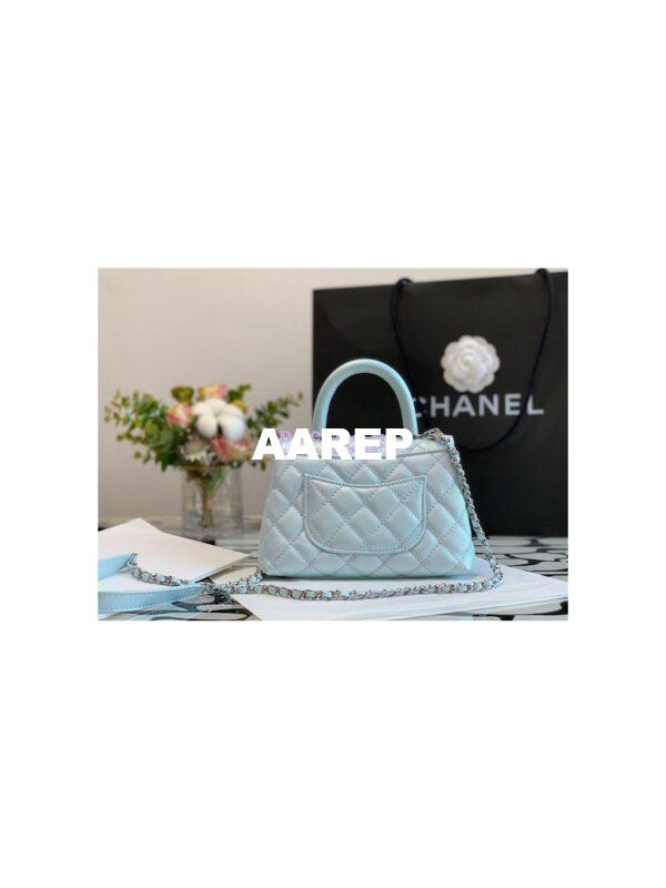 Replica Chanel Mini Coco Flap Bag with Top Handle in Iridescent Grained Calfskin with Shining Gold Hardware AS2215 Light Blue (Limited) 9