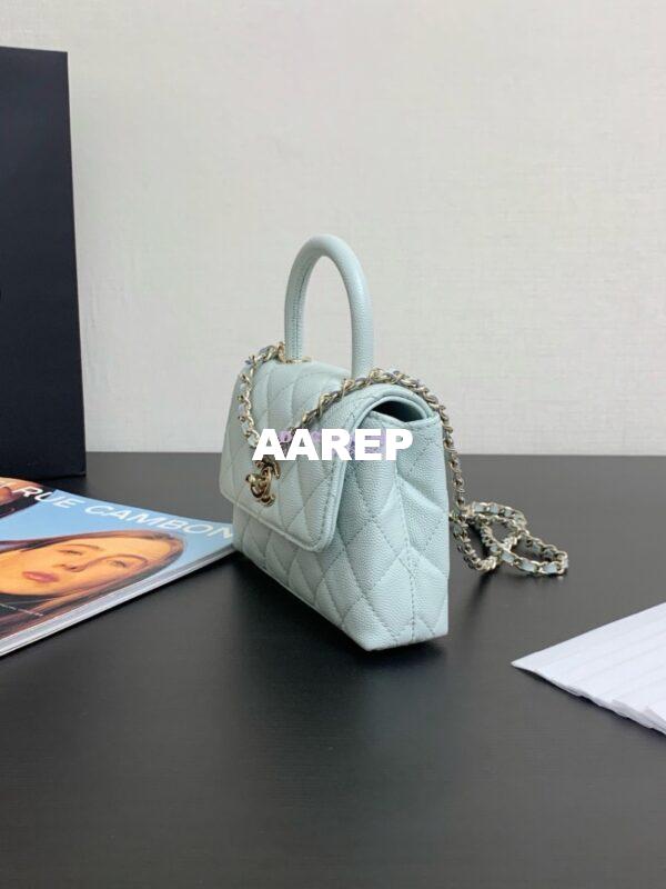 Replica Chanel Mini Coco Handle Bag in Caviar with Edge Stitching AS2215 in Light Gold Hardware Light Blue 3