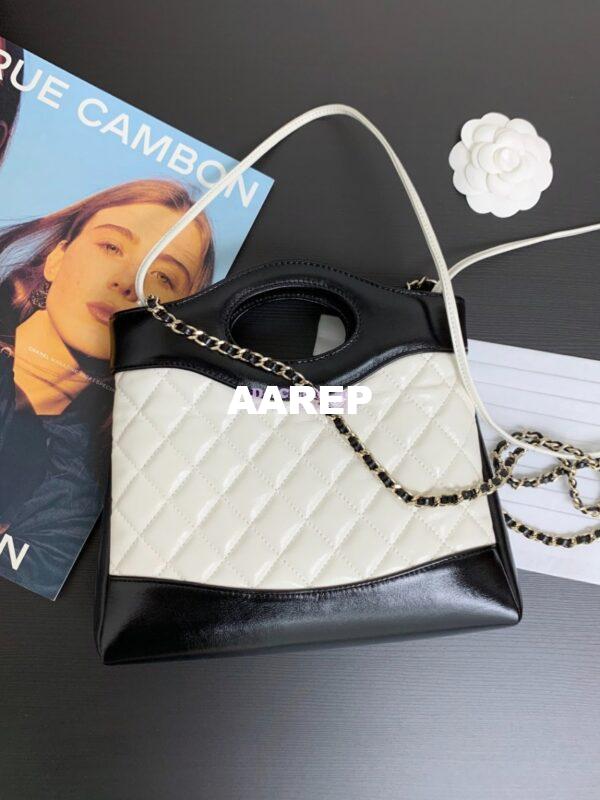 Replica Chanel Medium 31 Shopping Bag in Shiny Lambskin AS4853 White & Black 8