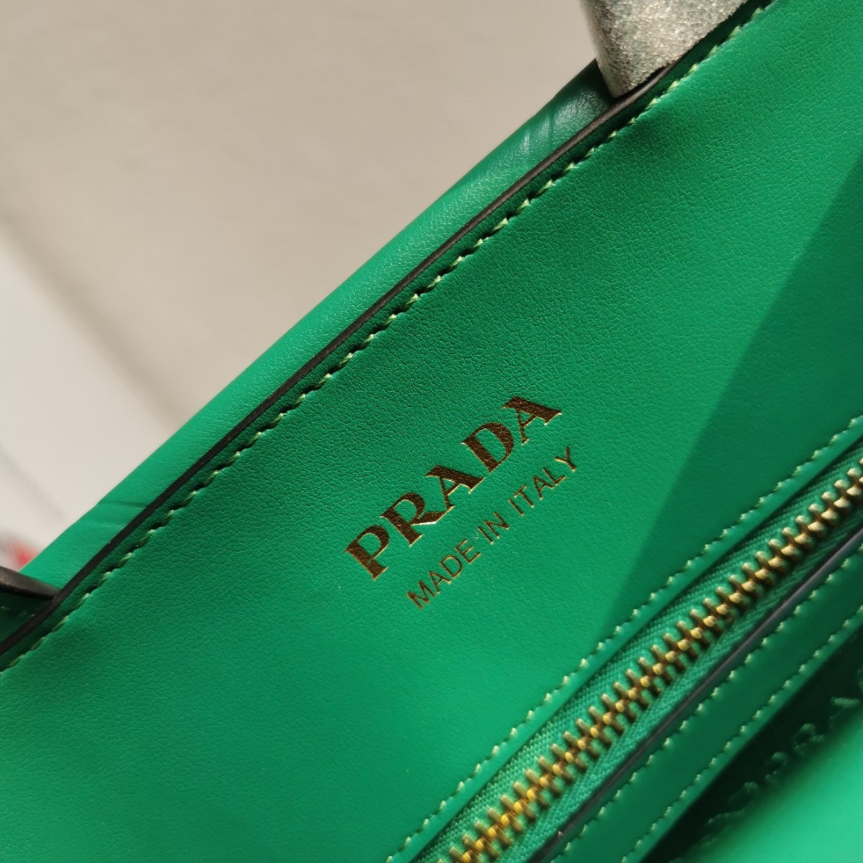 Prada Symbole Small Bag with Topstitching in Green Leather - Image 9